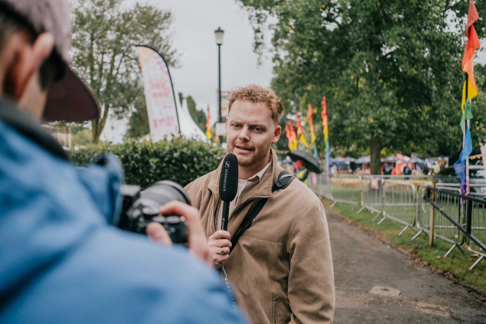A Good Grief presenter being filmed at an Isle of Wight food festival